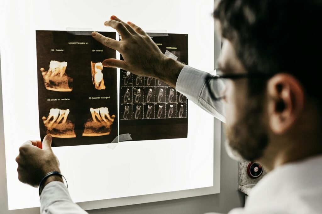 dental x ray being examined by a dentist